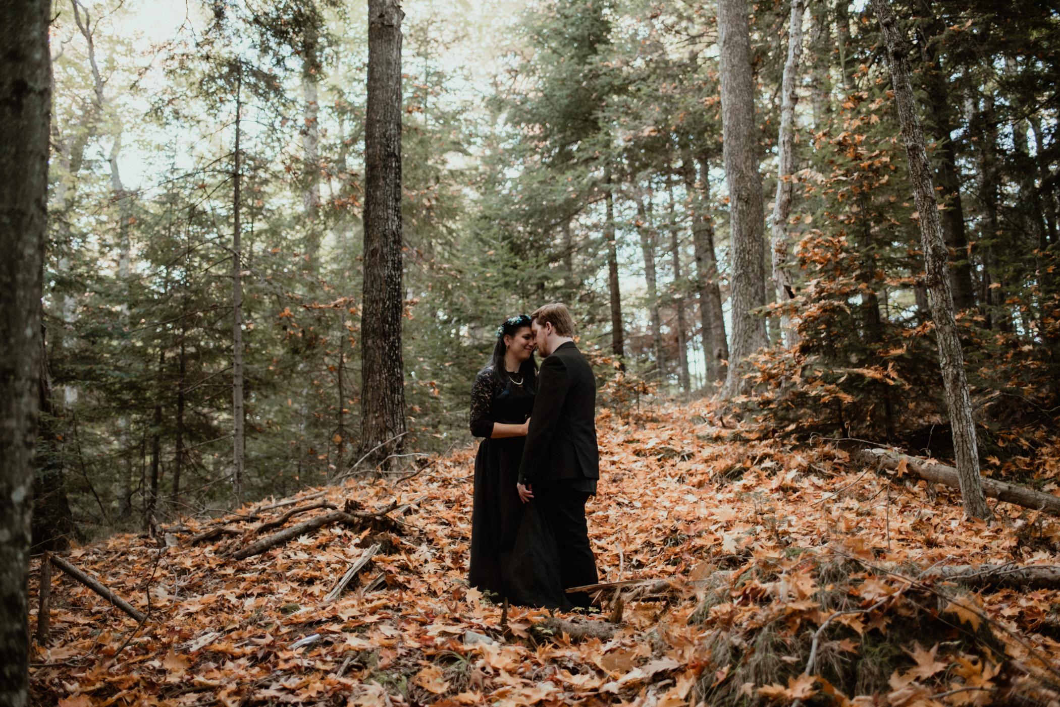 Cassandra and Josh in an autumn forest